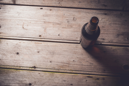 Beer on an old wooden tableの写真素材