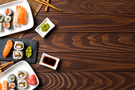 Set of Japanese sushi on wooden table. Top viewの写真素材