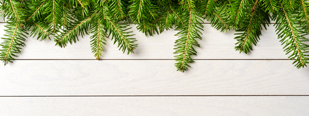 Christmas tree over white wooden background