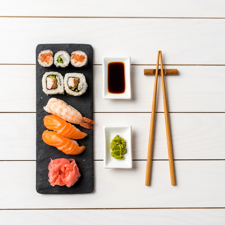 Set of Japanese sushi on white wooden tableの写真素材