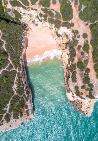 Aerial view of sandy beach and ocean with beautiful clear turquoise water.の写真素材