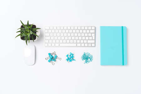 Elegant office desktop with accessories isolated on white backgroundの写真素材