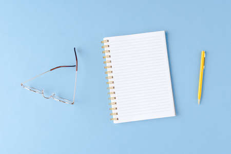 Notebook with copyspace with eyeglasses and penの写真素材