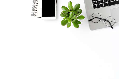 Elegant office desktop with laptop and business accessories. Top view