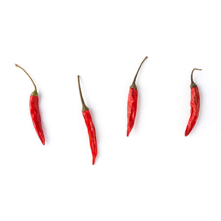 Red chilli peppers isolated on white background. Top viewの写真素材