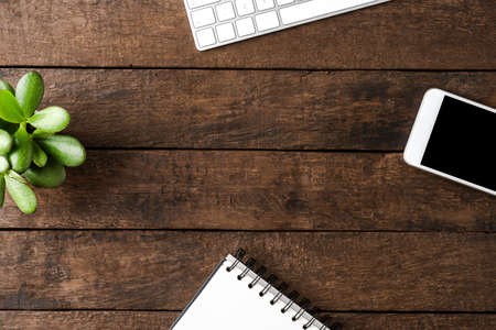 Business workspace with accessories on wooden background. Office desktop. Top viewの写真素材