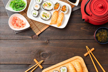 Japanese sushi on woden background. Top viewの写真素材