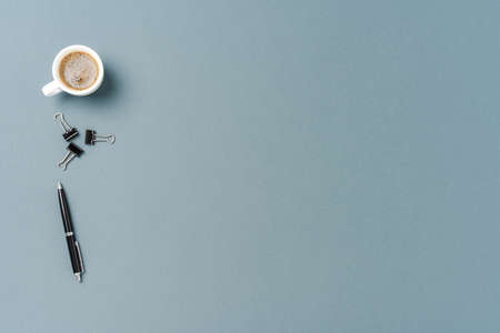 Business table with coffe and accessoriesの写真素材
