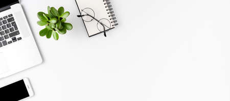 Business accessories isolated on white background with copyspace. Office desktop. Top view