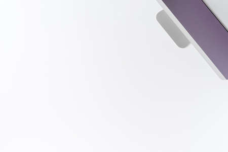 Overhead shot of computer monitor on white background. Office desktop. Flat layの写真素材