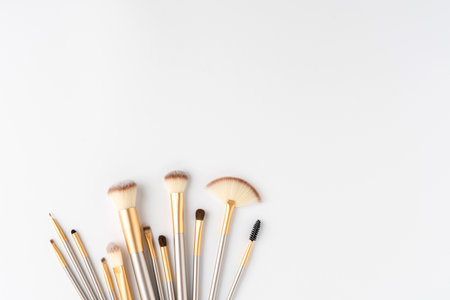Overhead shot of makeup brushes set isolated on white background with copyspaceの写真素材