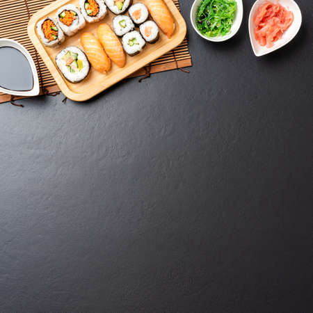 Japanese sushi served on stone background. Top viewの写真素材