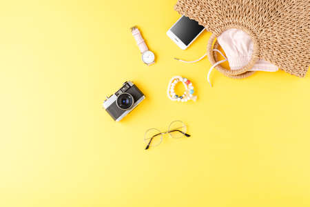 Summer straw bag with women's accessoriesの写真素材