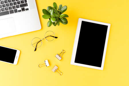 Office desktop with digital tablet and business accessories. Top viewの写真素材