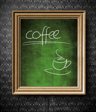 Coffee menu chalkboard in old wooden frame on vintage wallの写真素材