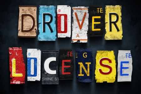 Driver license word on vintage broken car number plates, concept signの写真素材
