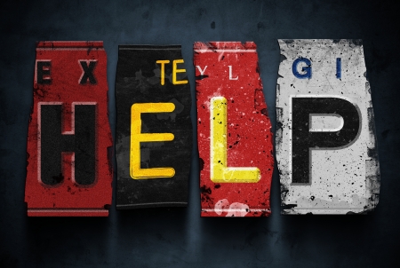 Help word on vintage broken car license plates, concept signの写真素材