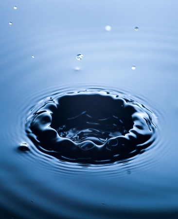 Water splash close up with drops, fresh liquid conceptの写真素材