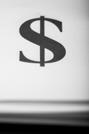 Close up too dollar sign on paper background, typographyの写真素材