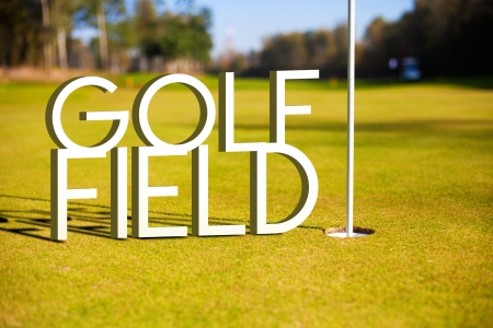 Golf field design background with photography and typographyの写真素材