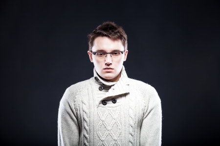 Portrait of tired young man in glassesの写真素材