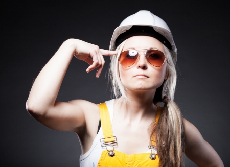 Fashionable young architect woman construction workerの写真素材