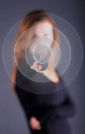 Business woman pushes button on digital touch screen, virtual backgroundの写真素材