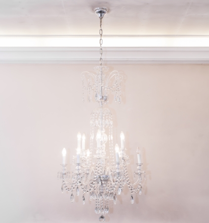 Crystal chandelier hanging on the ceilingの写真素材