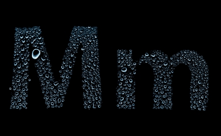 Water drops alphabet letter m, isolated on blackの写真素材