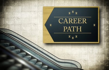 Moving escalator stairs with career path conceptの写真素材