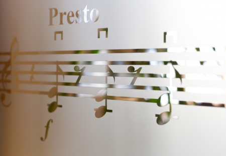 Musical notes on frosted glass, artistic backgroundの写真素材
