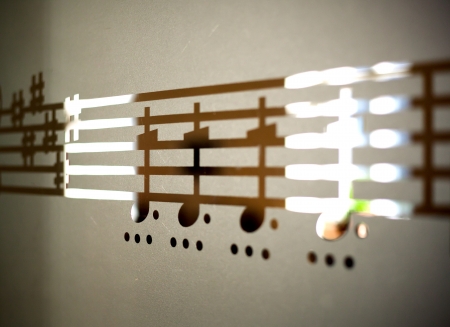 Musical notes on frosted glass, artistic backgroundの写真素材