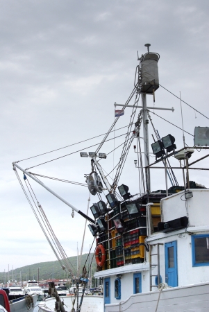Fishing boat in port or harborの写真素材