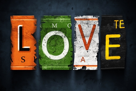 Love word on vintage broken car license platesの写真素材