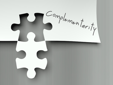 Complementarity concept with matching puzzle piecesの写真素材