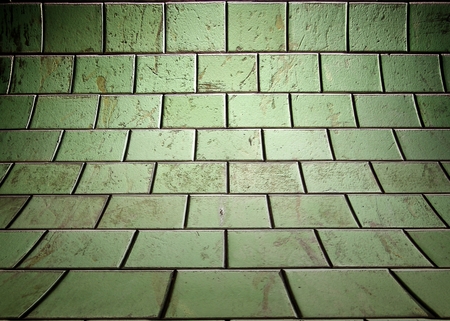 Wall with tiles texture in empty interiorの写真素材