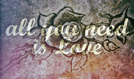 All You Need is Love message on stone rose backgroundの写真素材