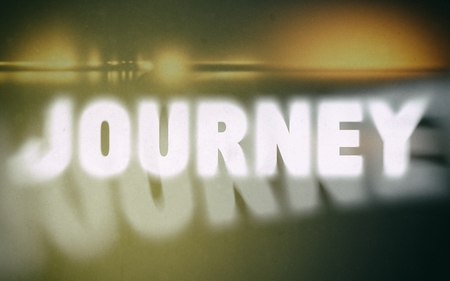 Journey word on vintage blurred background, concept signの写真素材