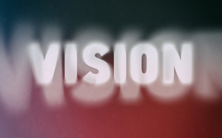 Vision word on vintage blurred background, concept signの写真素材