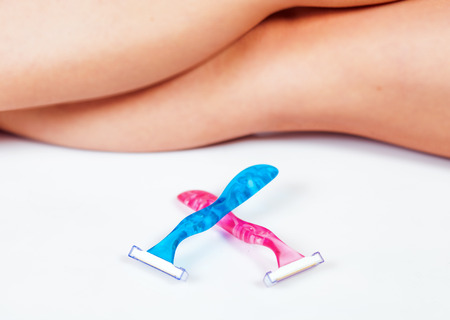 Woman's legs and razors, shaving conceptの写真素材
