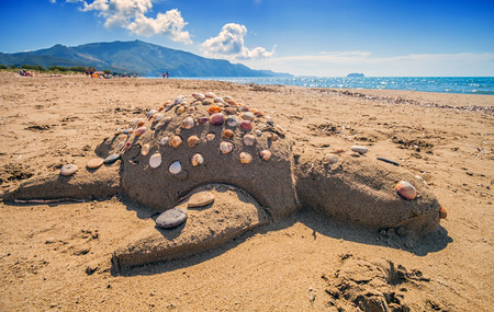 Turtle Caretta Caretta made of sand on beach, Laganas Zakynthos Greeceの写真素材