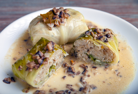 Stuffed cabbage meat in leaves with mushroom sauce, Golabki popular Polish dishの写真素材