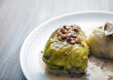 Stuffed cabbage meat in leaves with mushroom sauce, Golabki popular Polish dishの写真素材