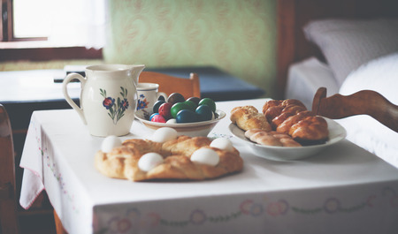 Traditional Easter breakfast at old house in european countryside, vintageの写真素材