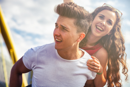 Young couple having fun and walking in the city, urban outdoorの写真素材