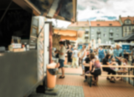 Food truck festival, blurred image for backgroundの写真素材