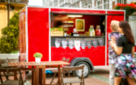 Food truck festival, blurred image for backgroundの写真素材