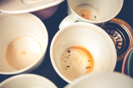 Dirty dishes in the black sinkの写真素材