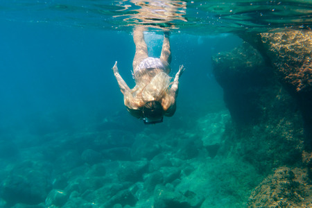 Snorkeling underwater in the tropical sea