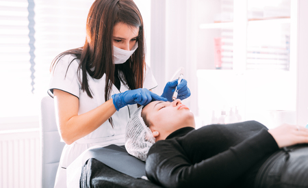 Professional skin care, procedure Microdermabrasion of the facial skin at cosmetic clinicの写真素材